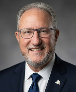 Dr. Russell Sabella, school counseling keynote speaker and author specializing in technology, AI, and data-driven school counseling practices.