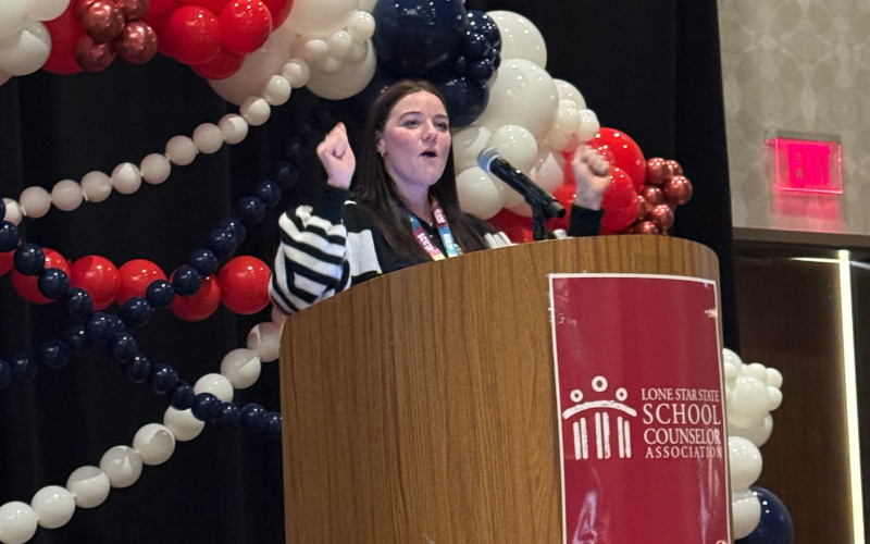 Speaker presenting at a podium during the LSSSCA Conference