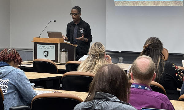 man presenting to educators