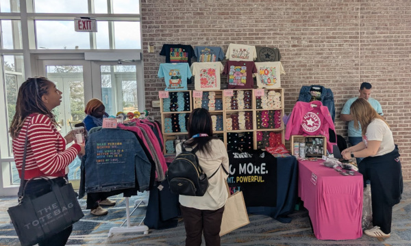Exhibitor space set up to sell t-shirts to school counselors