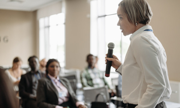 Professionals listening to a presenter